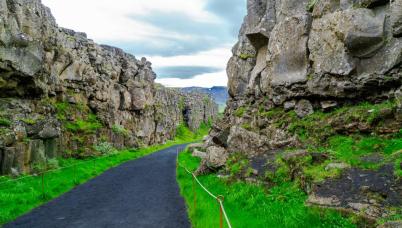 Icelandic rope-guided path between two steep stone cliffs