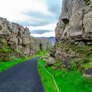 Icelandic rope-guided path between two steep stone cliffs