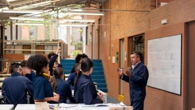 Teacher and students in lab