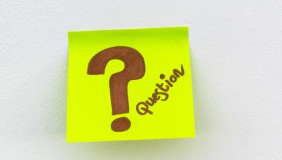 Question mark on sticky note