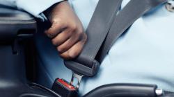 Person buckles their seatbelt