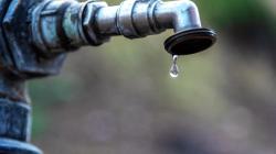 Drop of water falling from a poorly closed tap